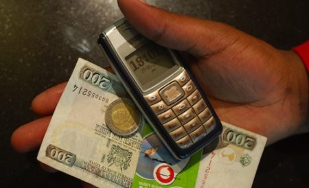 Money goes mobile, and global