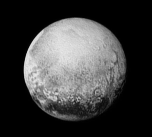 Pluto seen about a quarter of a rotation before the top image. The fractures at the lower right had rotated out of view by the time of closest approach (the "heart" was just beginning to rotate into view on the left (image: Nasa/JHUAPL/SWRI)