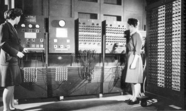 Programmers Betty Jean Jennings, left, and Fran Bilas operate Eniac's main control panel at the Moore School of Electrical Engineering