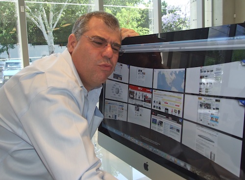 Talk Radio 702's Aki Anastasiou makes his feelings known towards the new 27-inch Apple iMac at the product's launch in Sandton last week