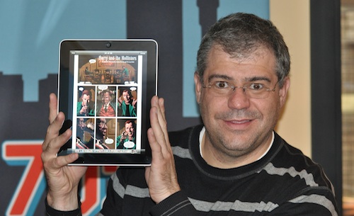 Talk Radio 702's Aki Anastasiou showing off the Apple iPad