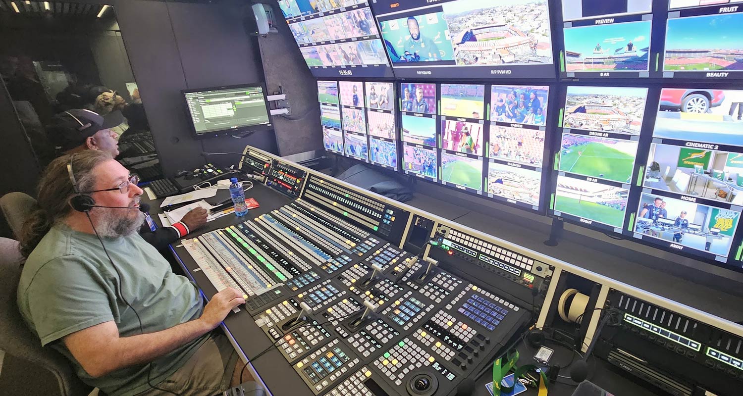 Match day director Alvin Naicker (left, background) and Jaco Engels, production vision mixer (left, foreground), inside SuperSport's IP1