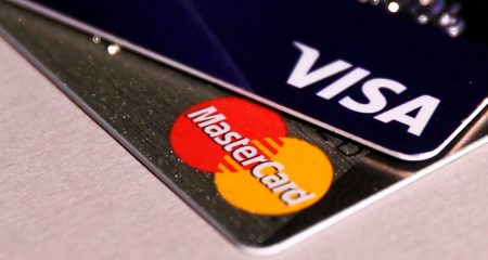 Call for crackdown on Visa and Mastercard over fees