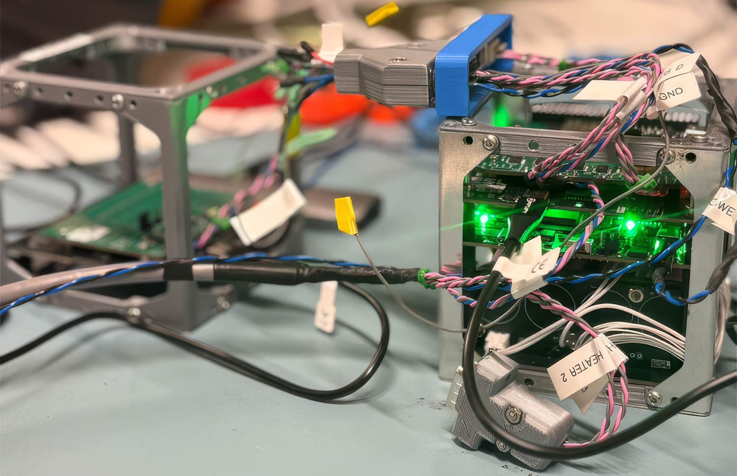 The electronics functional model built by the SU team. During the testing phase, the test model sent data between the Balls model, left, and a mock lander unit, right. Image: Africa2Moon