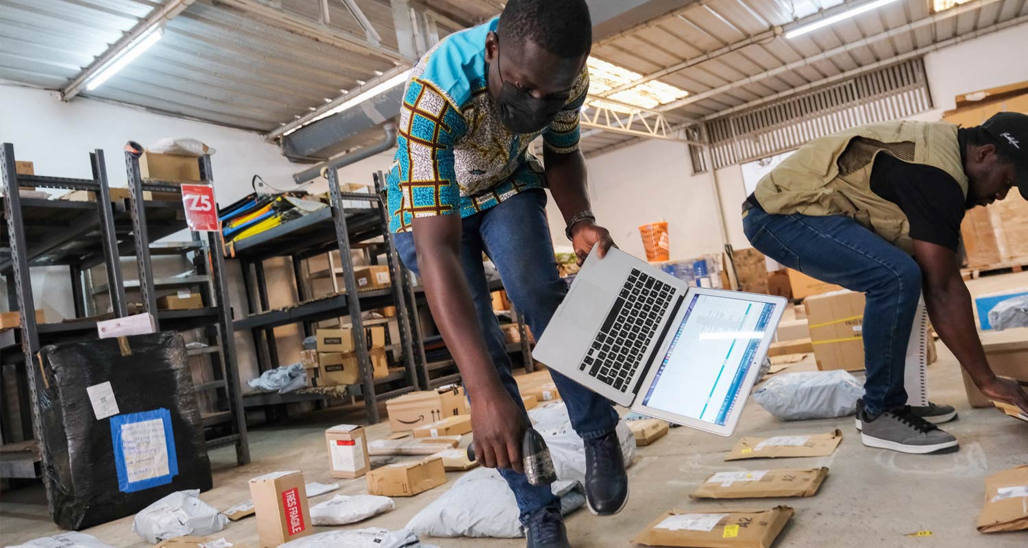 Bouba Mane organises packages at Afrety headquarters in Dakar, Senegal. Ricci Shryock/Reuters